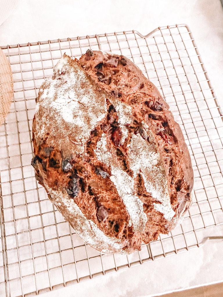 Maggie’s dark chocolate inclusion loaf cooling on a wire rack